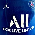 Beranda Detailed view of Paris Saint-Germain jersey with sponsor logos and design elements.